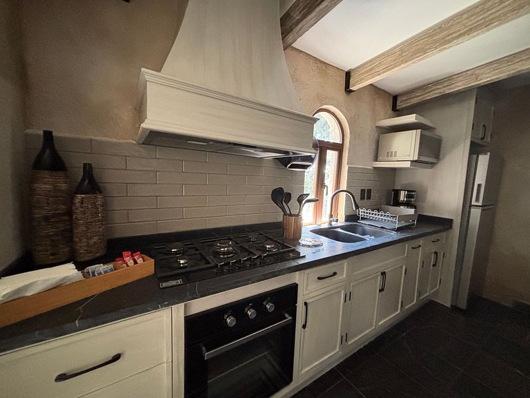 Departamento Zeus: Estilo y Confort en Val’Quirico